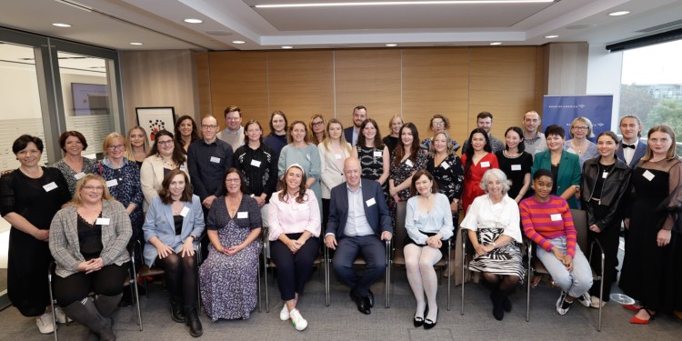 Photo of SEI Ideas Academy group posing formally for a group photograph